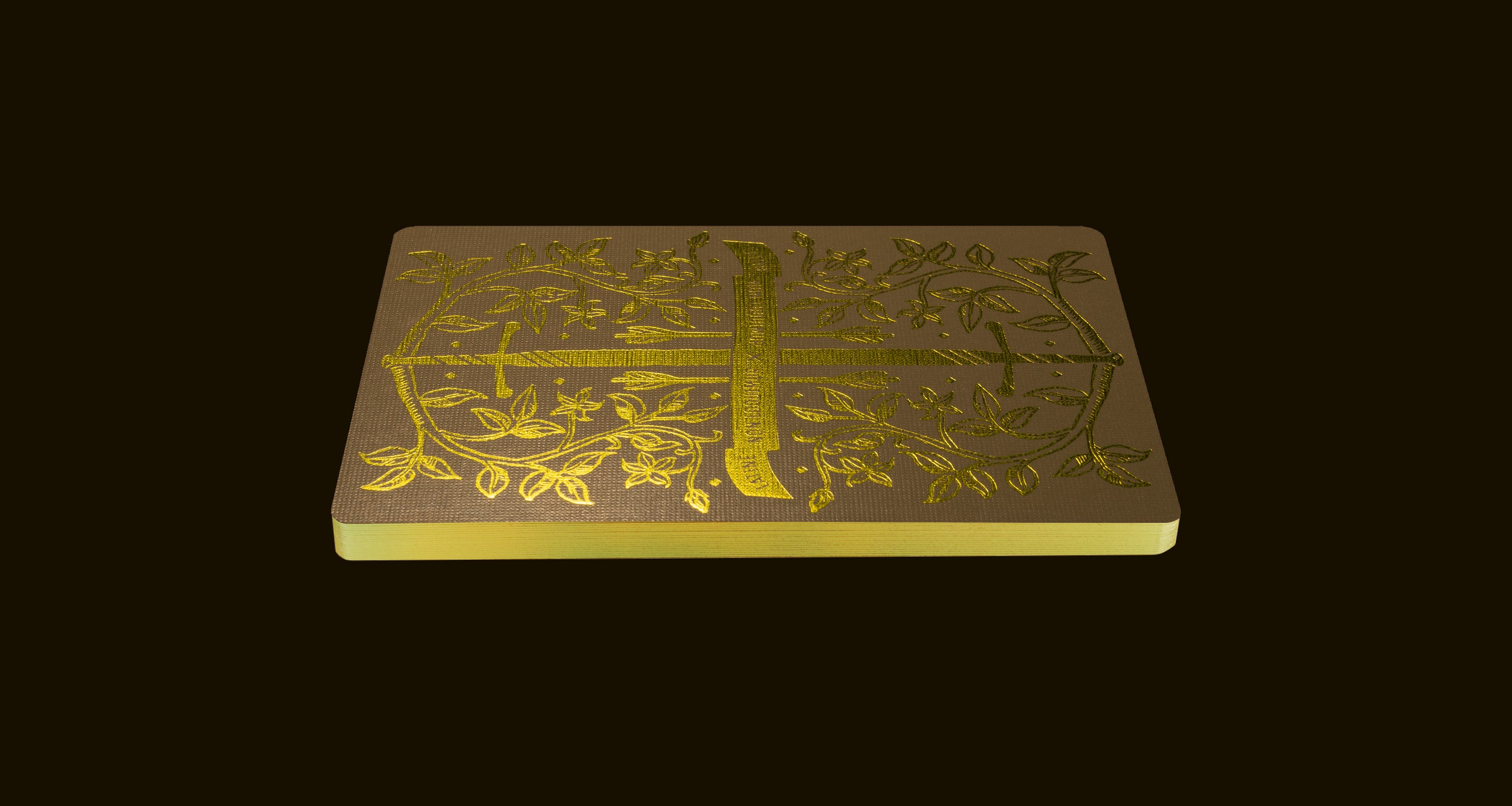 A green playing card back on a dark brown background