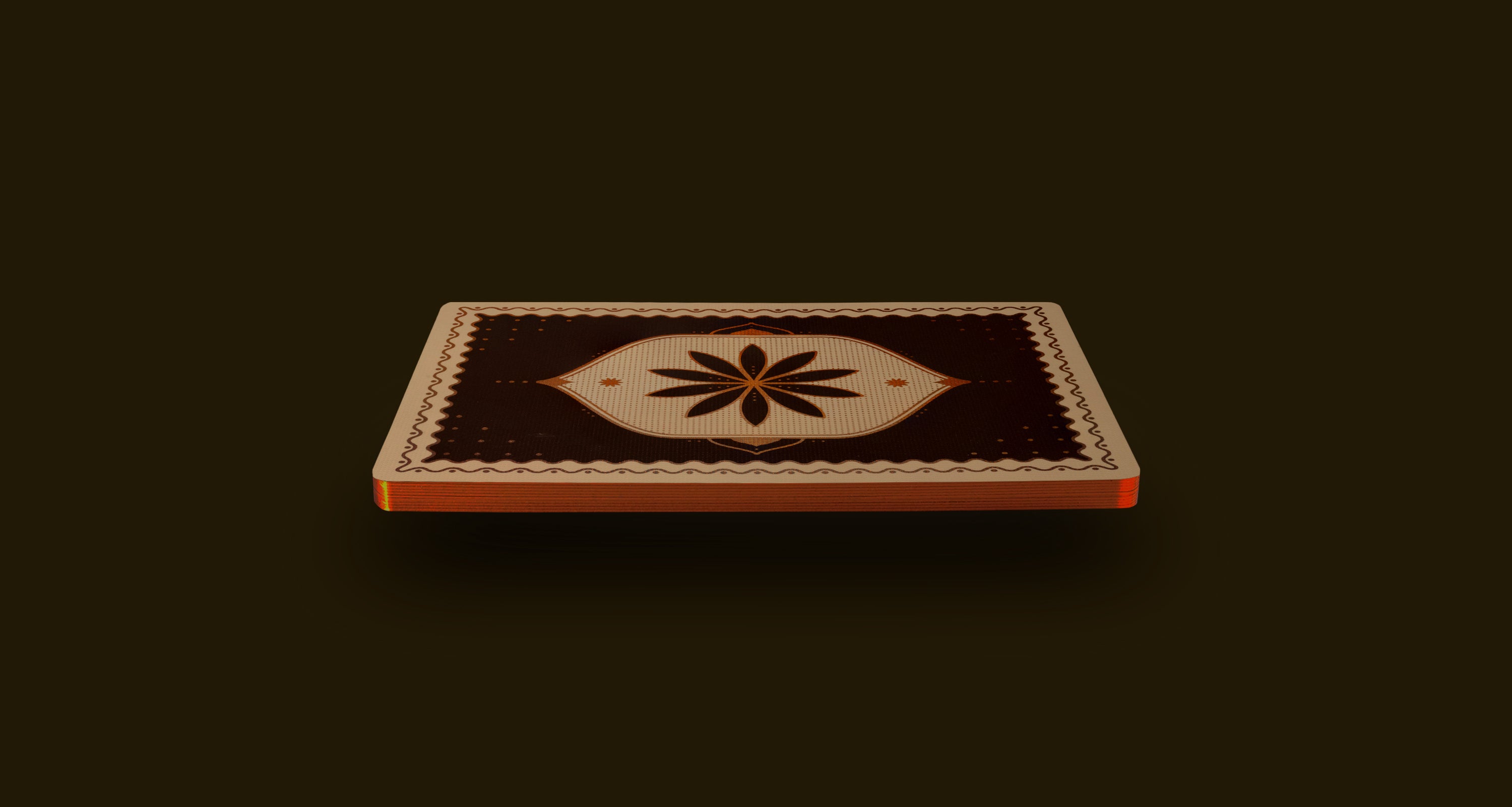 A floating card back on a brown background