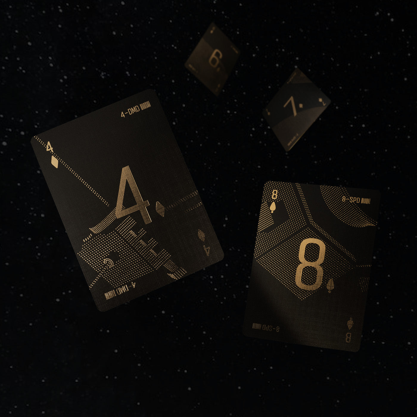 Four playing cards floating in space