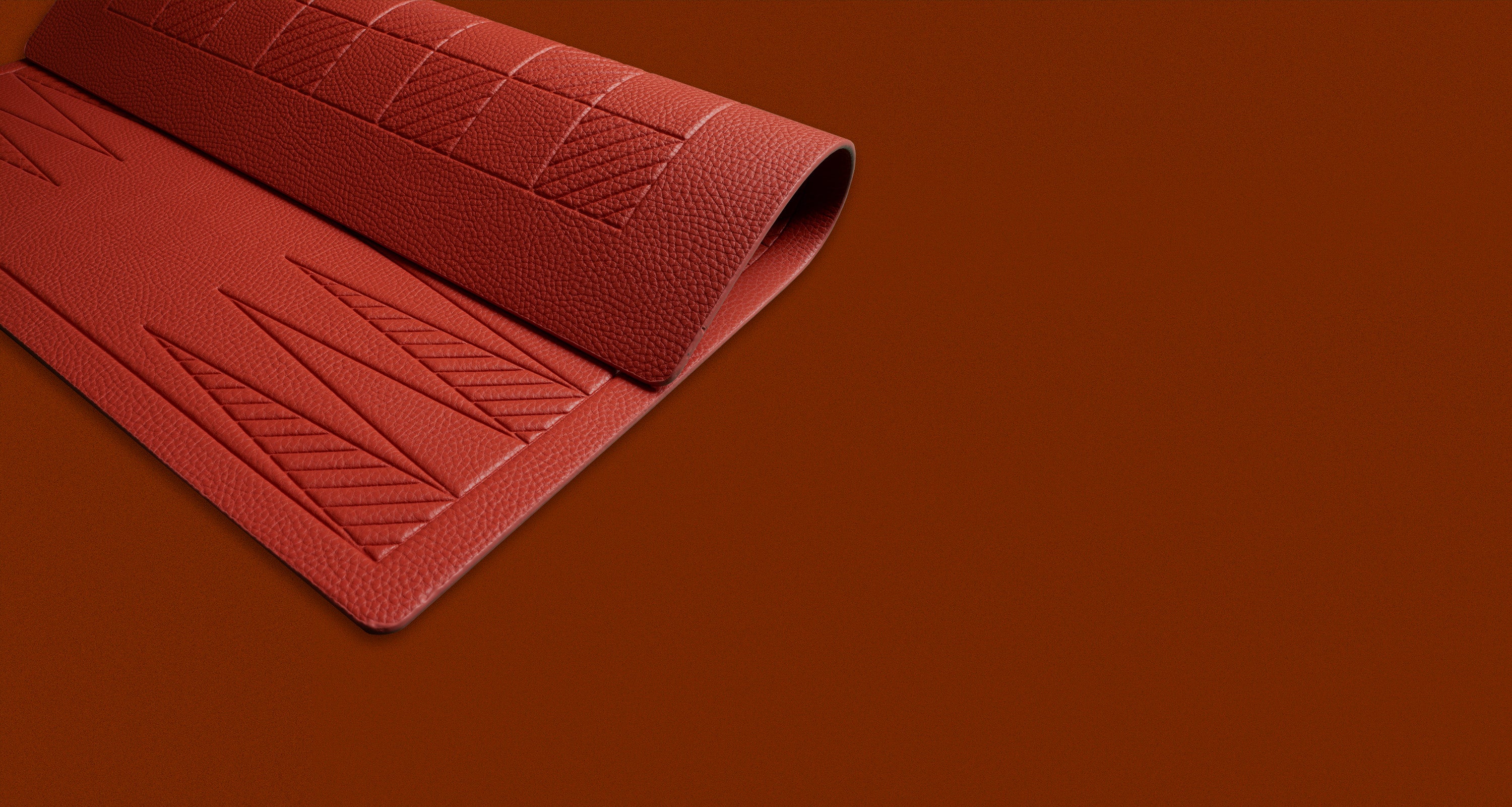 A flexible backgammon and checkers board in a lobster color