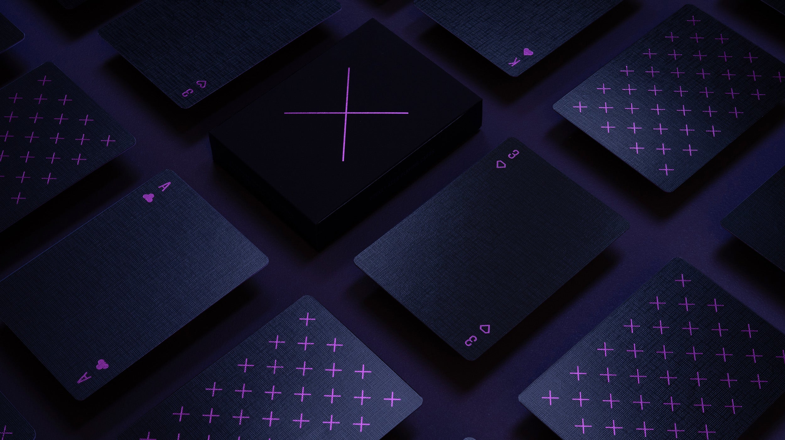 A photo of a navy deck of cards on a table