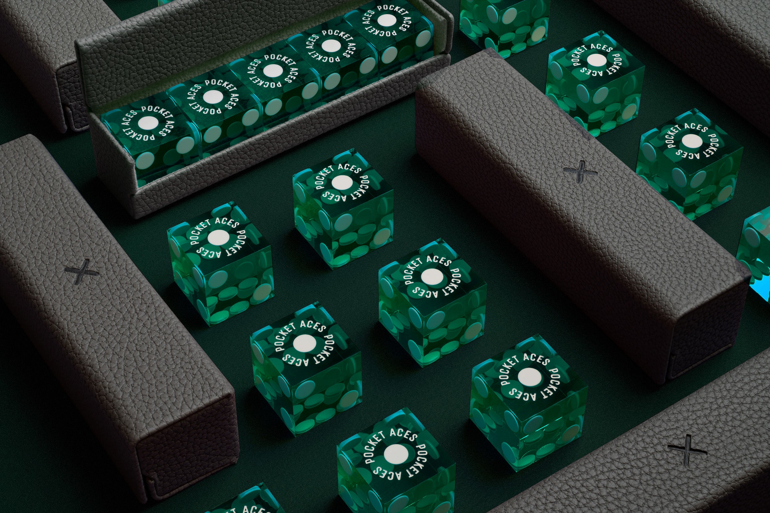 A set of casino style dice and cases arranged on a table