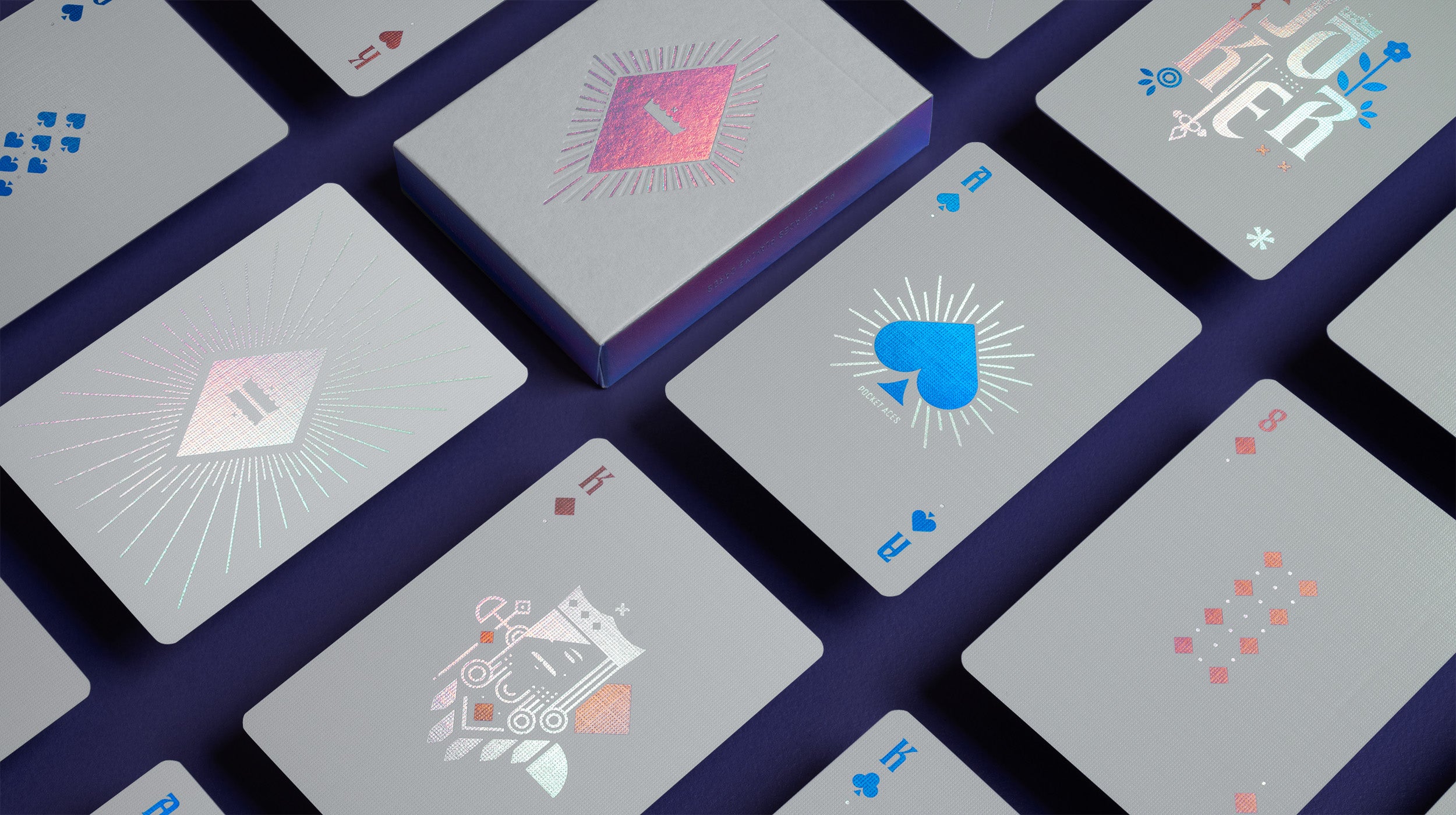 A light grey deck of playing cards on a table