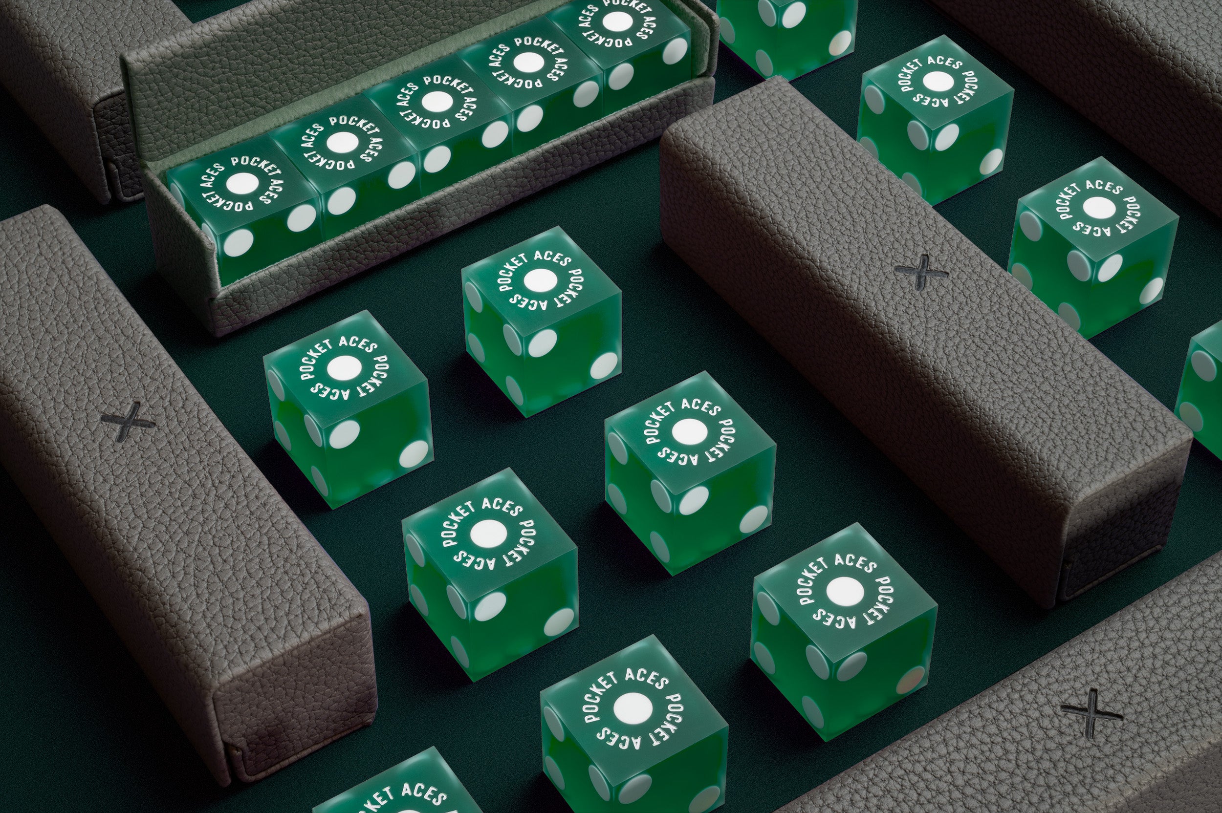 A set of casino style dice and cases arranged on a table