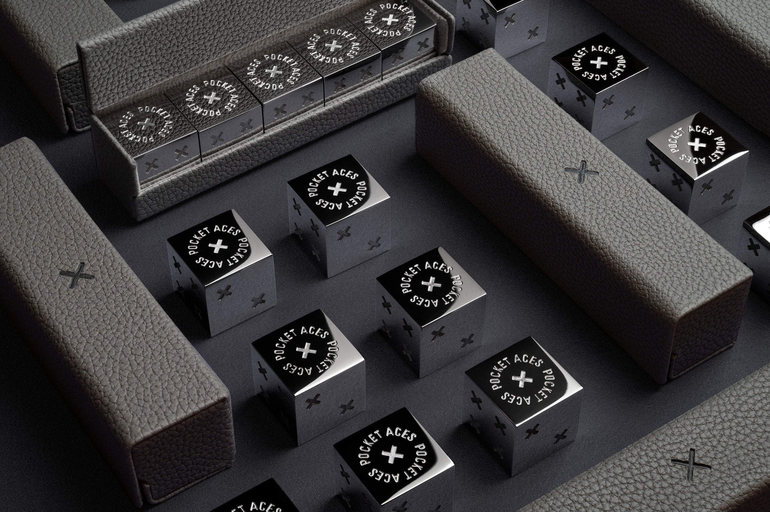 A set of stainless steel deice and cases arranged on a table