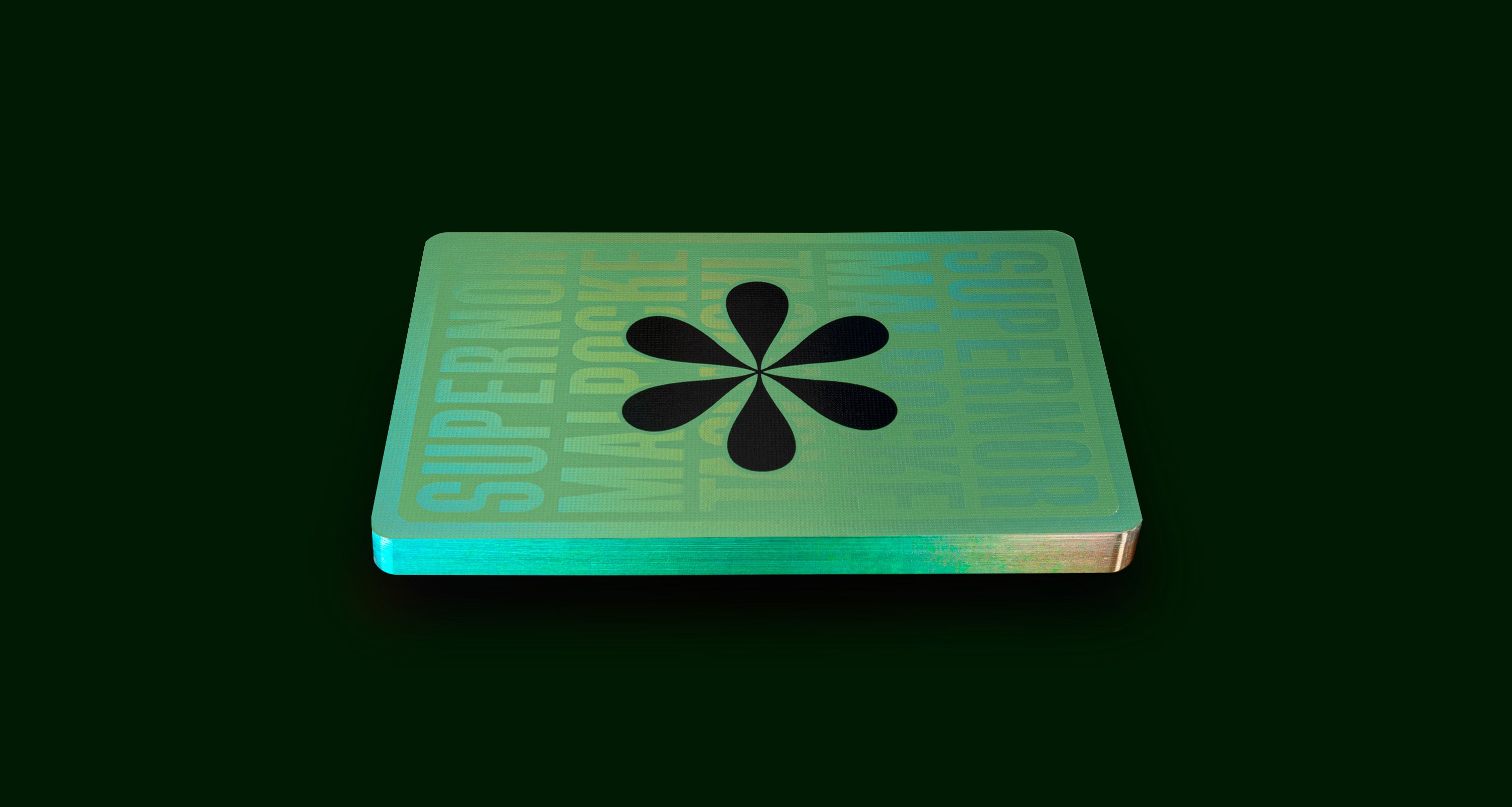 A playing card back floating on a green background