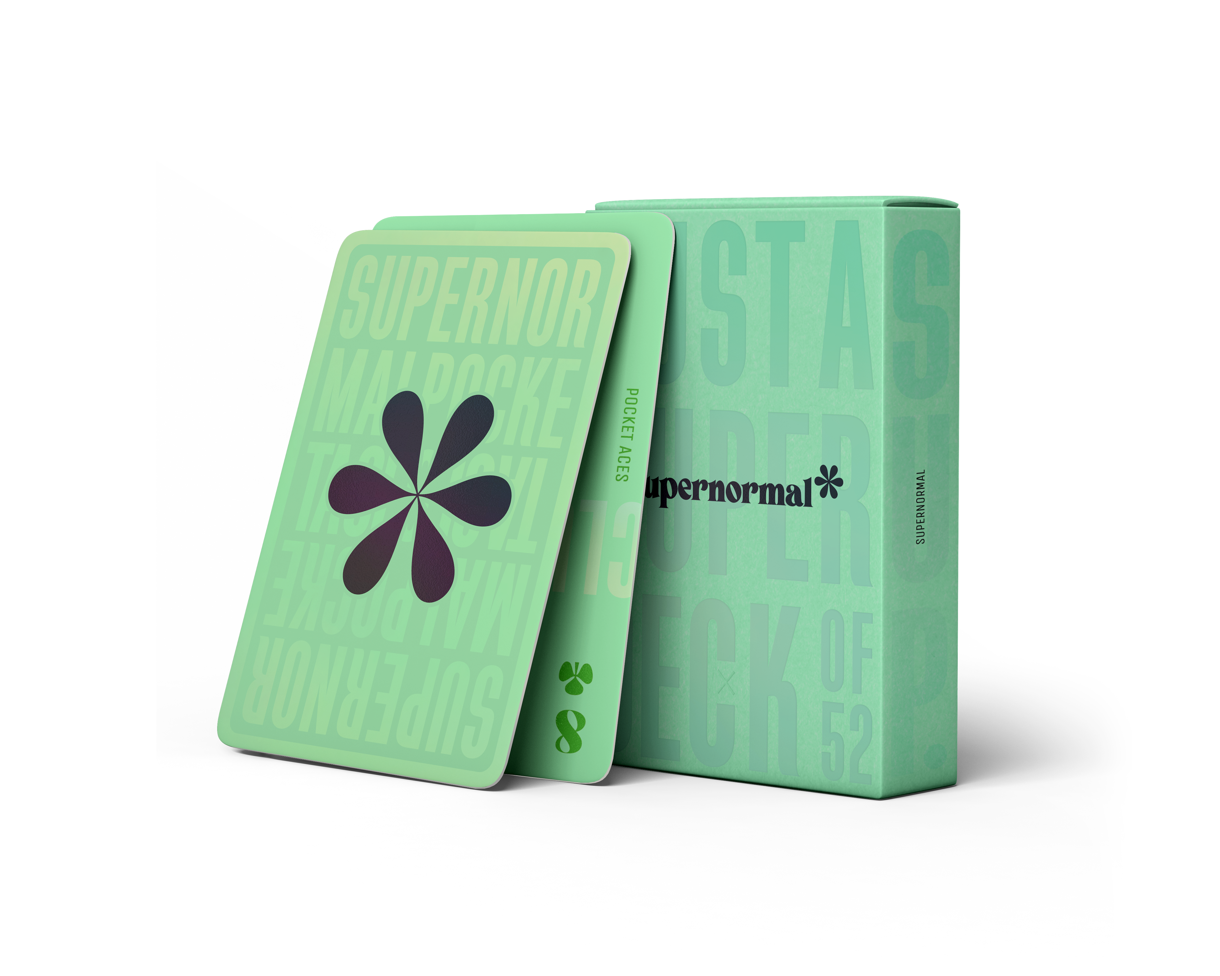 A mint colored deck of playing cards and its as associated box.
