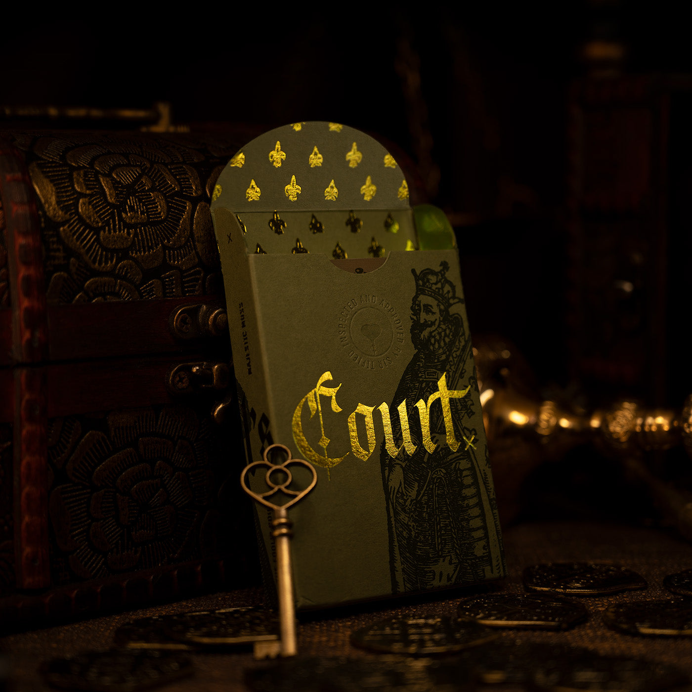 A playing card box with medieval styling