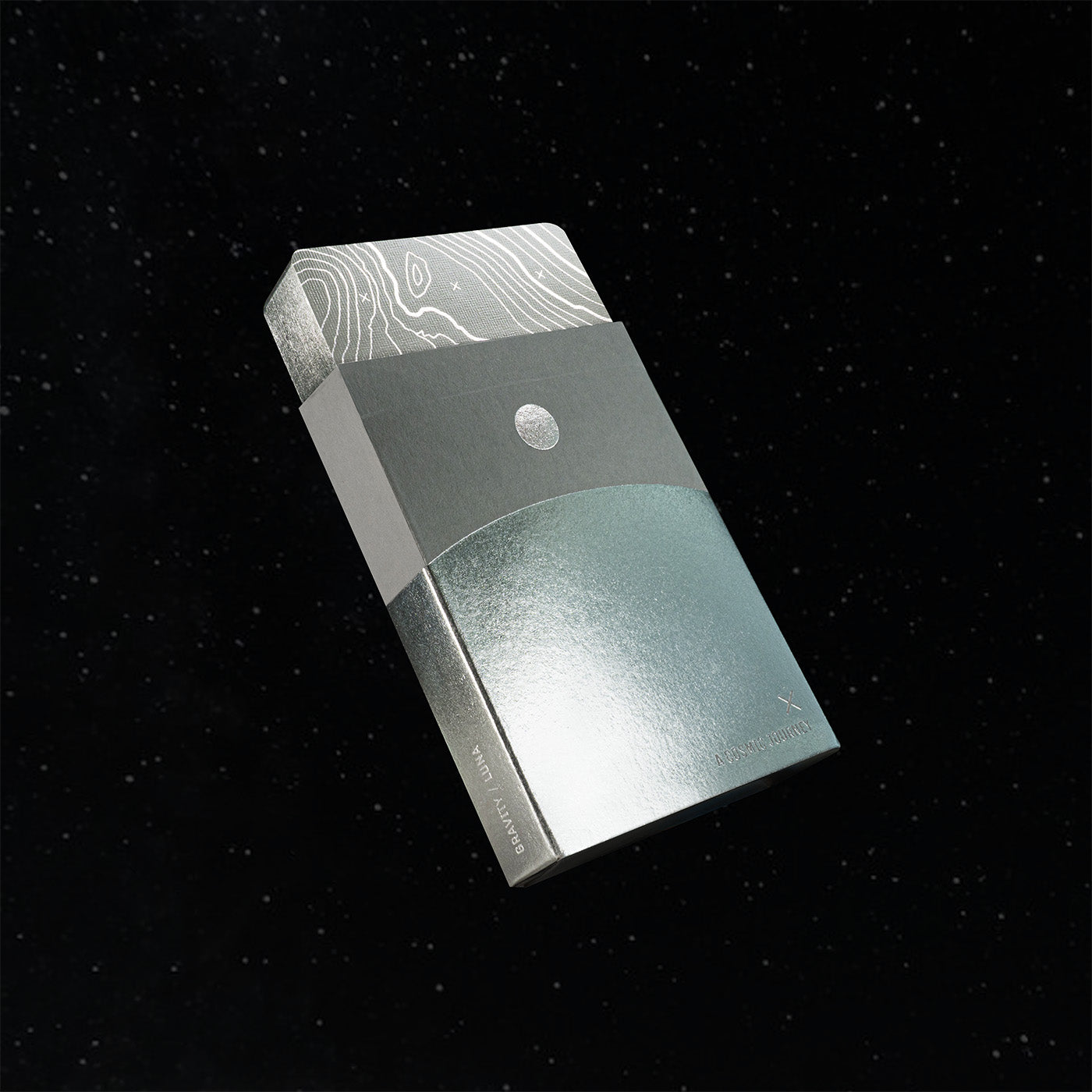 A deck of foiled playing cards floating in space