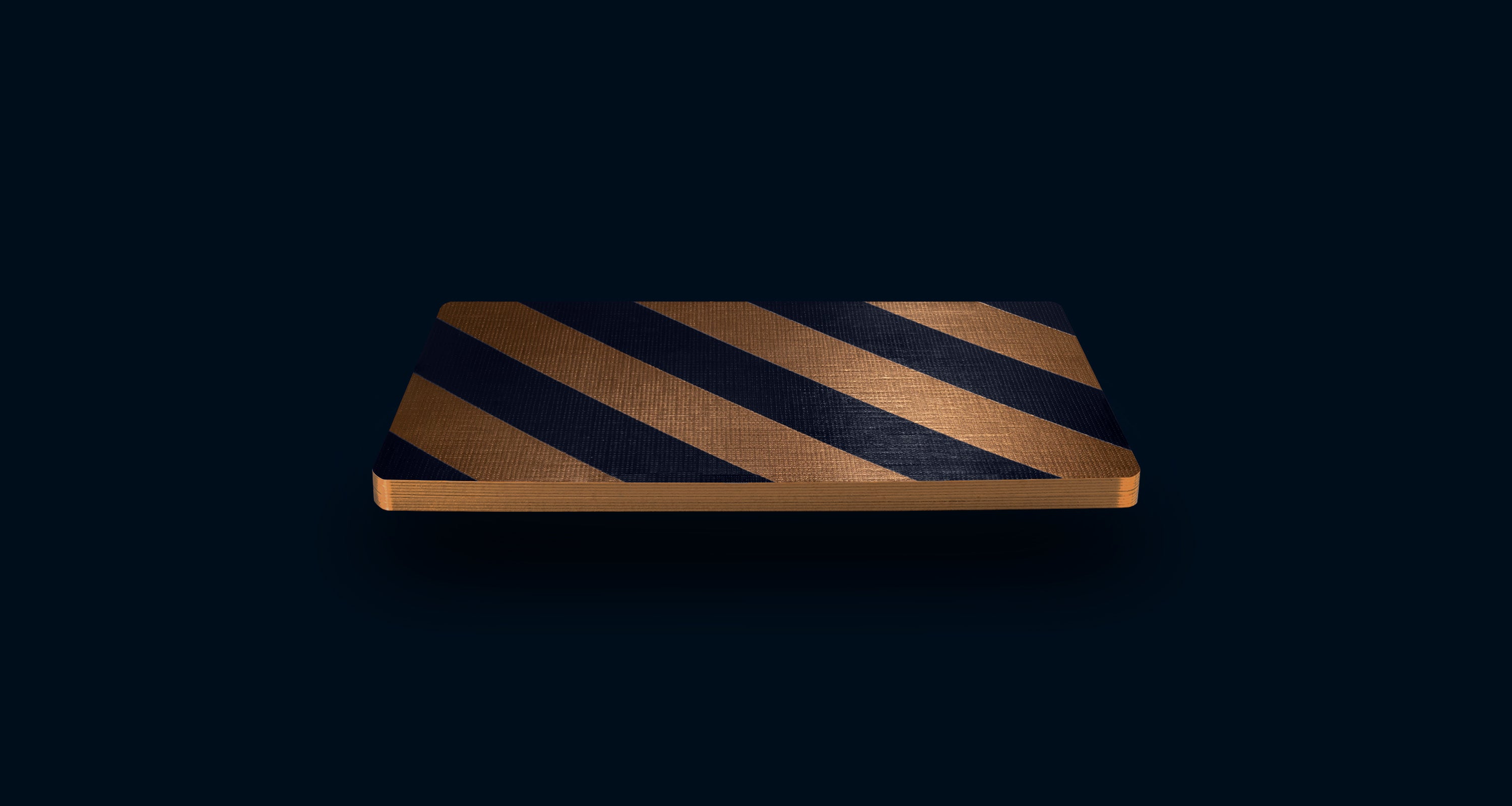 Gold striped playing card floating on a dark background