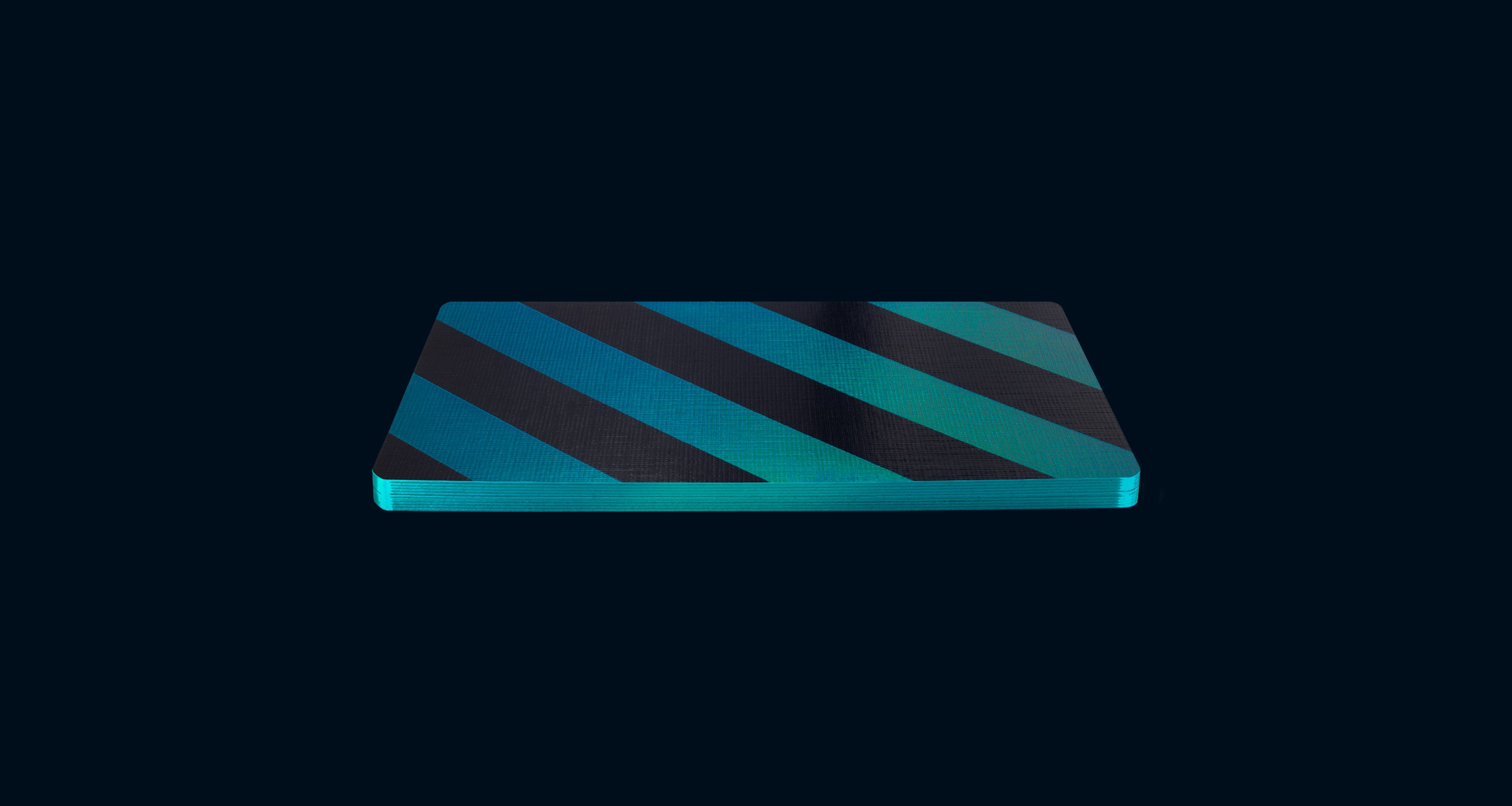 Blue and black striped playing cards on a dark blue background