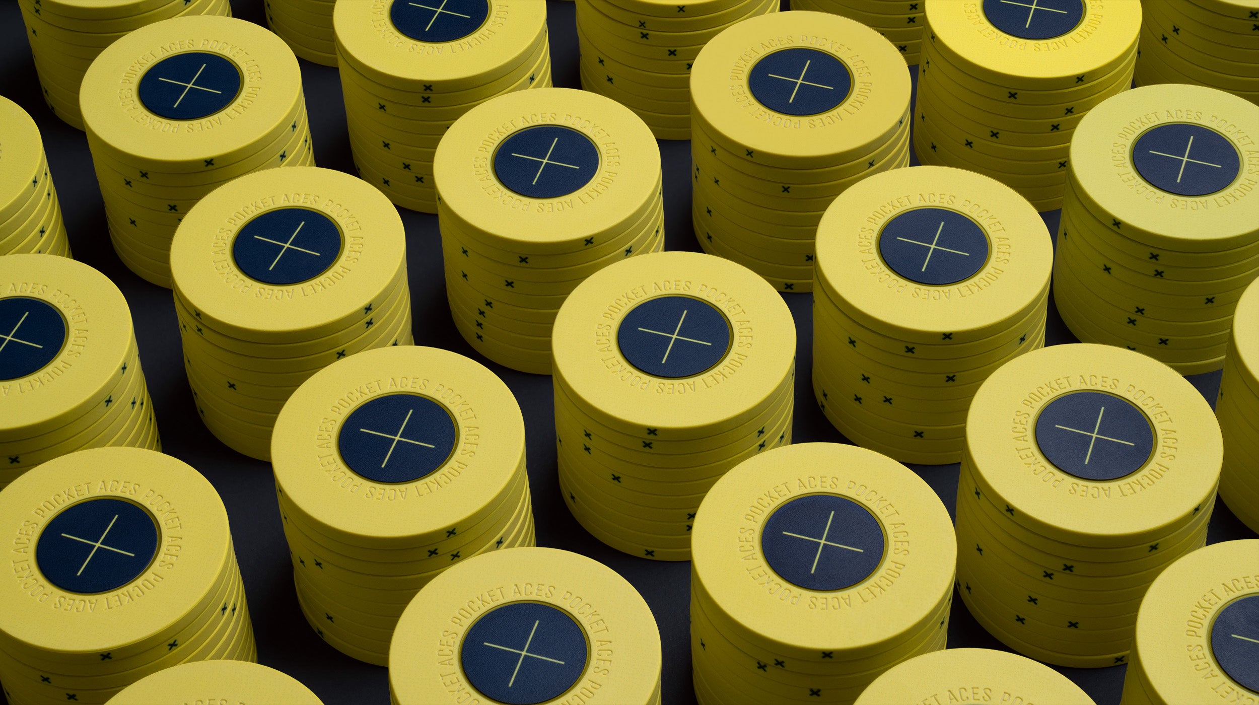 Rows of lemon colored poker chips on a table