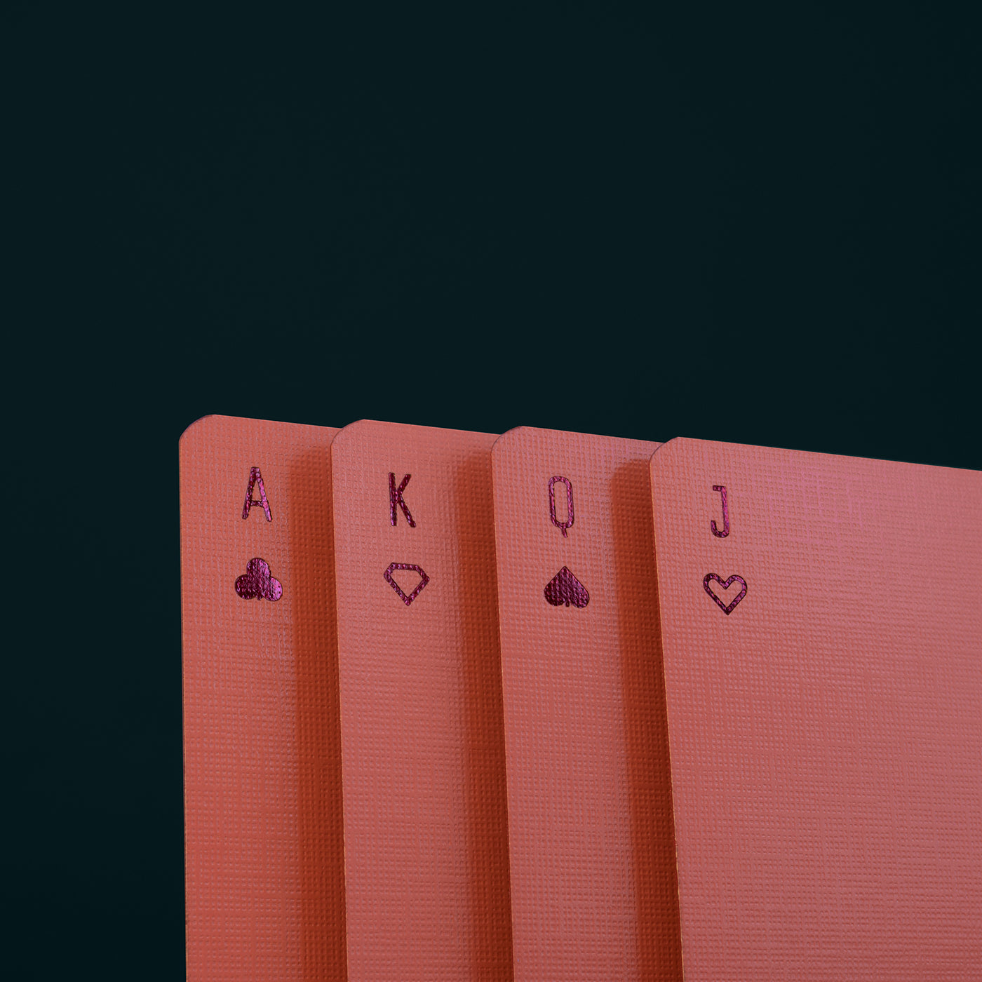 Four playing cards with coral foil