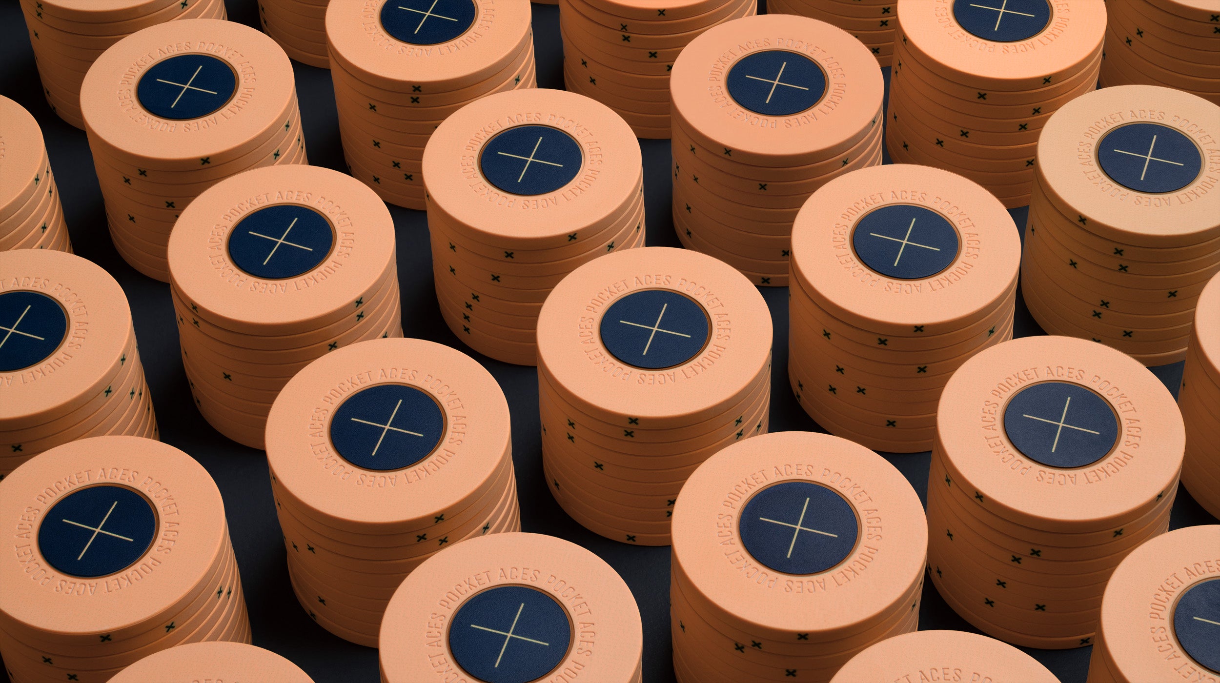 Rows of sherbet colored poker chips on a table